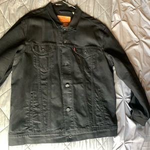 Levi’s all black jean jacket.